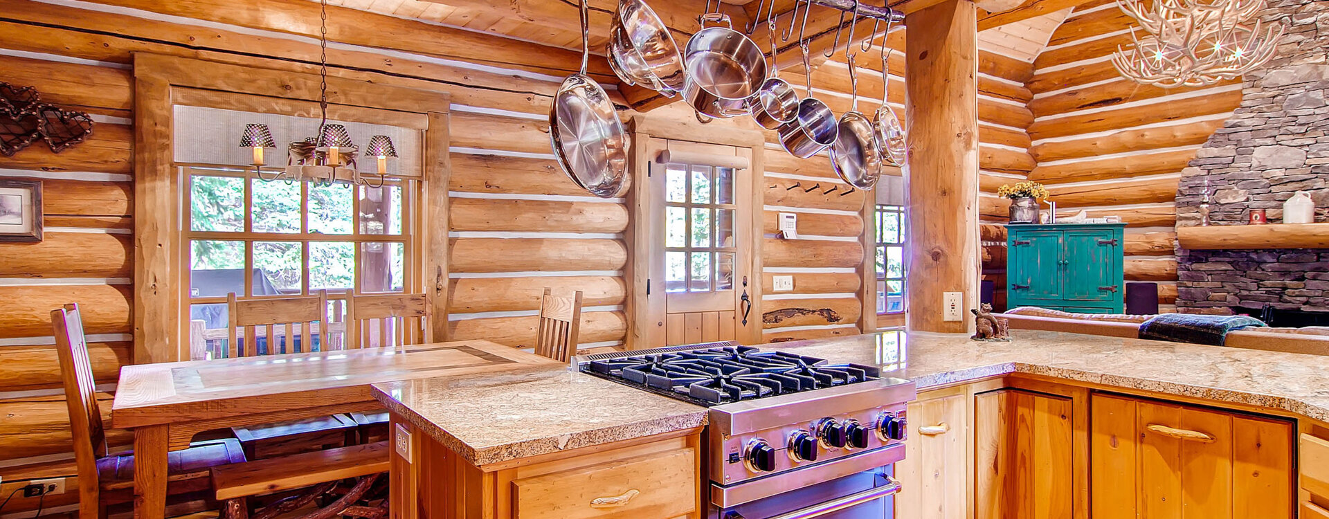 12 117 Yellowbrick.jpg open kitchen looking to dining table which overlooks front porch