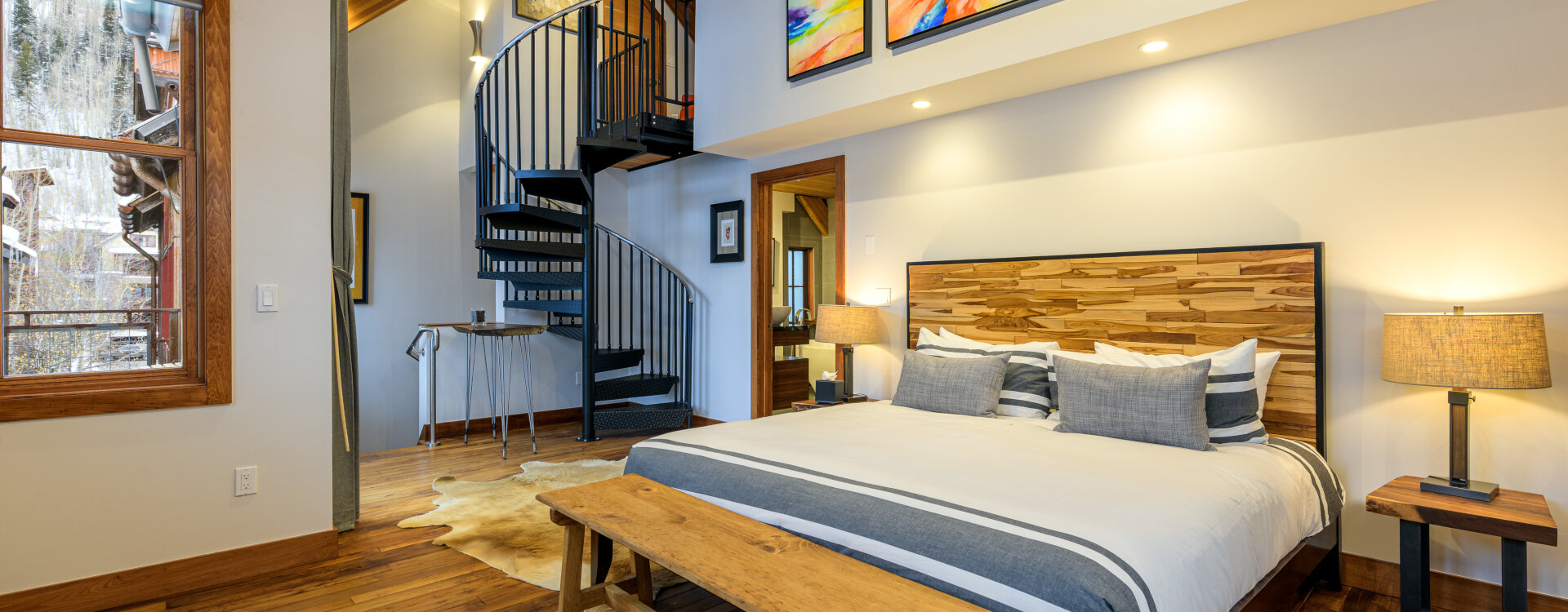 3.04-telluride-local-luxury-primary-bedroom-suite-spiral-stairs
