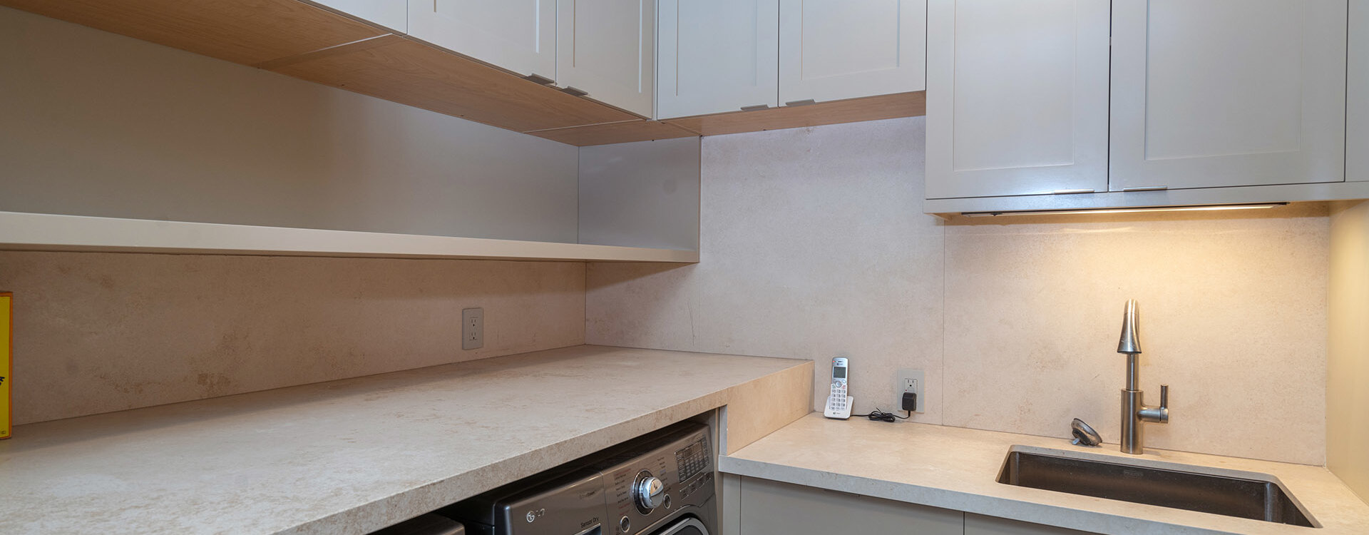 13.1-129-rocky-rd-mountain-village-laundry-room