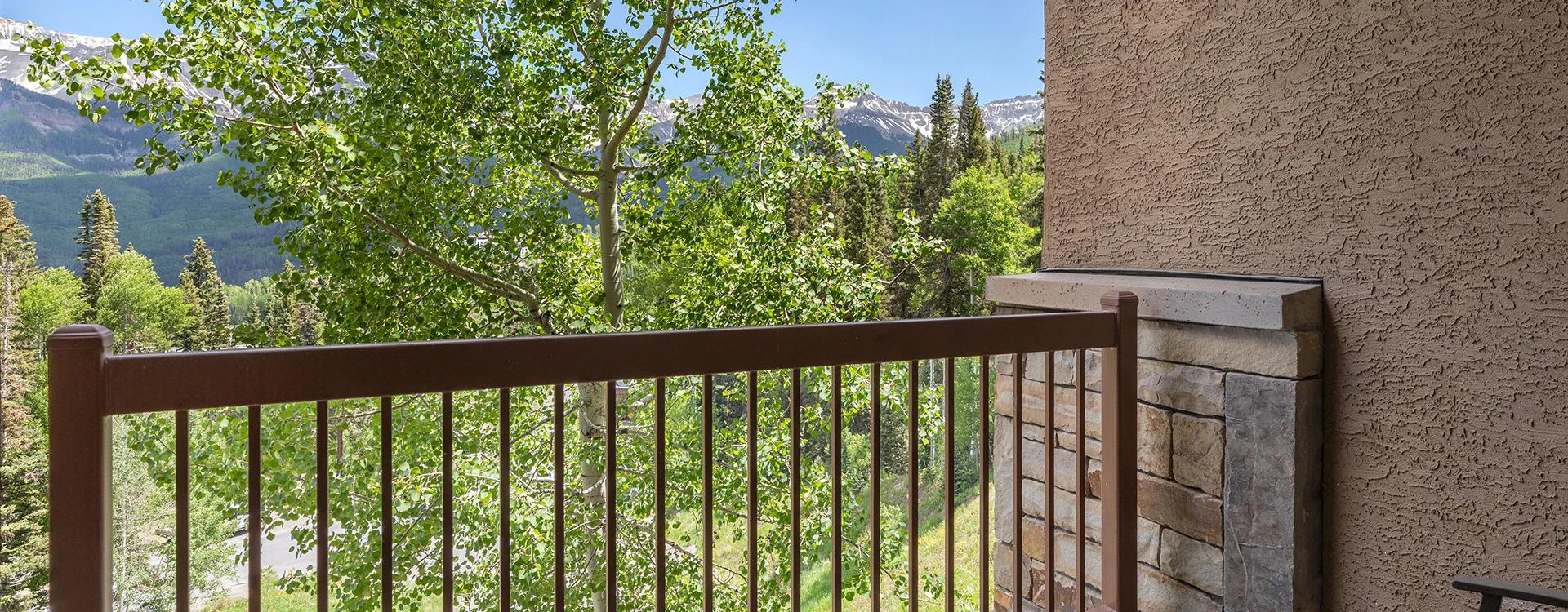 5.4-lorian-luxe-mountain-village-primary-suite-deck.webp